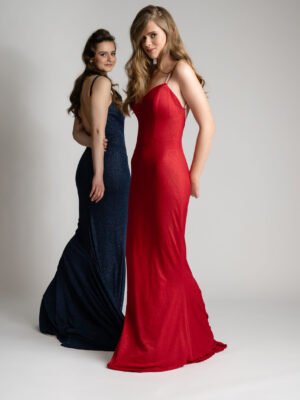Two elegant women wearing Megara debs dresses in different colors, showcasing the sleek open-back design and flowing silhouette.